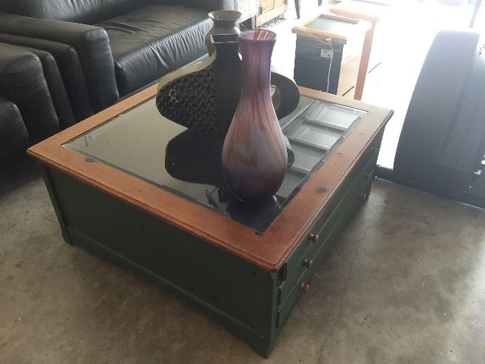 Square coffee table with lots of storage