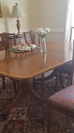 Federal Reproduction inlaid edge Duncan Phyfe Dining Room Table w/ three leaves. Total length with leaves 11 foot. W/pads.