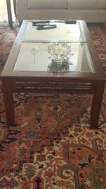Rooms to Go Coffee Table with Glass Top. Rug not included.