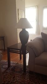 Rooms to Go end Table with Designer Lamp. Rug not included.