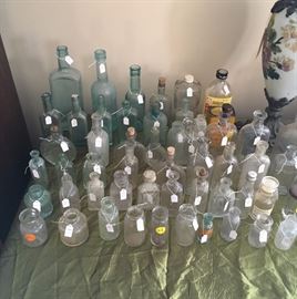 Vintage and antique bottles of all sizes and colors