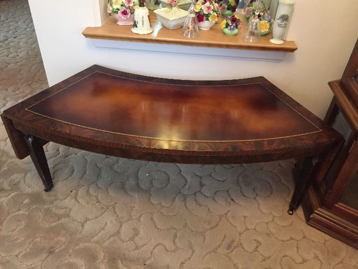 Leather topped Curved coffee table with fold down edges