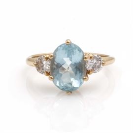 14K Yellow Gold Aquamarine and Diamond Ring: A 14K yellow gold aquamarine and diamond ring.
