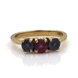14K Yellow Gold Tanzanite and Ruby Ring: A 14K yellow gold ruby and tanzanite ring.