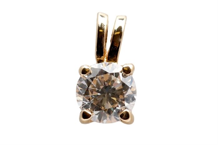 14K Yellow Gold 0.52 CT Diamond Pendant: A small yellow gold pendant holds a faceted round cut basket prong set diamond.