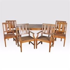 Restoration Hardware Teak Table With Matching Chairs and Umbrella: A Restoration Hardware teak table with matching chairs and umbrella. This teak table set from Restoration Hardware is from the Santa Monica collection. It features a rectangular table with tapered legs, four side chairs and two arms chairs with tapered legs and curved arms. Also included is an octagonal teak umbrella that features brown Sunbrella fabric and pin pulley system with stand. Each piece is labeled with a metal plate engraved “Restoration Hardware.”