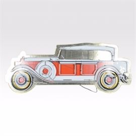 Vintage Neon Car Sign: A vintage neon car sign. This large sign has a car-shaped frame, with neon lighting forming an outline throughout. A data plate attached to the transformer box is marked “VT Ventex Technology, Inc./neon power supply-indoor type 7/model: VT9030D-120."