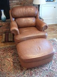 Leather chair and ottoman by Distinction Leather.