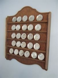 Silver individual salts in rack.