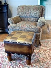 Occasional chair and leather foot stool.