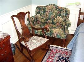Queen Anne style loveseat and ornate antique cherry wood rocking chair.