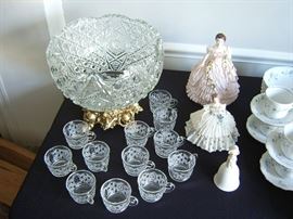 Vintage punch bowl set and lace figurines.