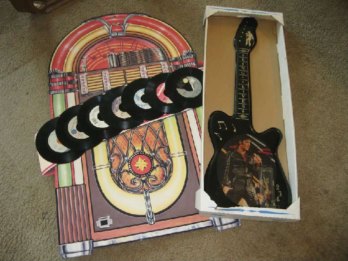 Elvis clock guitar and juke box poster with 45 RPM records