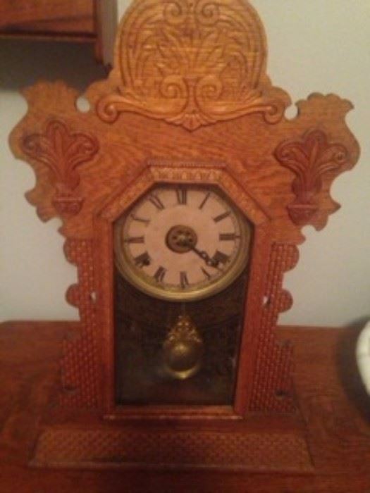 Antique carved gingerbread clock.