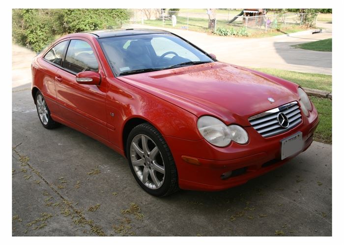 2003 Mercedes-Benz C230 Kompressor 2-Door Coupe: A 2003 cherry red Mercedes-Benz C230. Kompressor coupe; VIN is WDBRN40J73A461492. This is a 2-door, four passenger vehicle with 129,036 miles. It has a supercharged 1.8L 4-cylinder engine and an automatic transmission. The car has a leather interior with burl wood trim center console, a Bose sound system, and Mercedes-Benz rims with Yokohama tires.