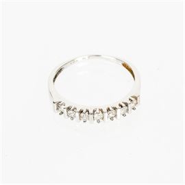 10K White Gold Ring with Diamonds: A 10K white gold ring with diamonds.