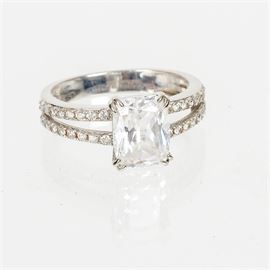 14K White Gold Ring with Cubic Zirconia: A 14K white gold ring with cubic zirconia.
