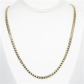 Italian 14K Gold Necklace: An Italian 14K gold necklace. This is a curb chain necklace with a lobster claw clasp. The end is marked 14K Italy.