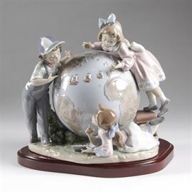 Lladro "The Voyage of Columbus" Figurine: A Lladro “Voyage of Columbus” figurine. Featuring a porcelain figurine depicting children with a large world globe. The figurine is marked on the bottom “Lladro Hand Made in Spain DAISA 1991” with two signatures and “N-1443”. Included is the original box marked “El Viaje De Colon The Voyage of Columbus 05847”.