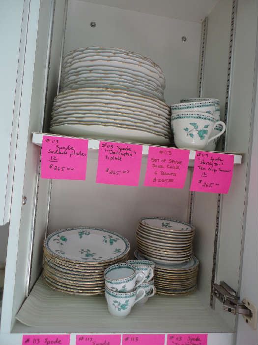various sets of dishware and matching teacups and saucers