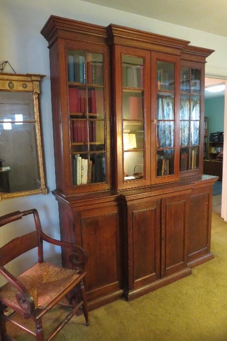 Available for presale! Commanding 2 piece Antique English Oak step back bookcase.  85" tall, 20" deep at the center, 64" long (shelves are 6-1/2" deep ) $900.  Call for appointment.   