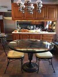 Cast Iron Pedestal Table with Glass Top and Six Matching Chairs