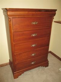 There are two of these high boy dressers
