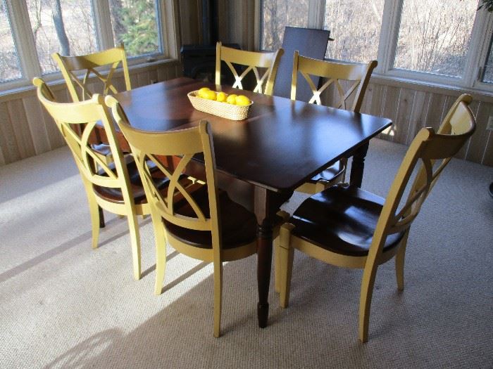 Nichols & Stone casual dining set.  Six chairs and one table leaf.