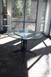 GLASS TOP WROUGHT IRON TABLE ....WITH 4 CHAIRS