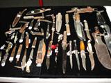 Quite a collection of knives including a 1916 Marbles sheath knife and a WWII era German fighter knife with sheaths.