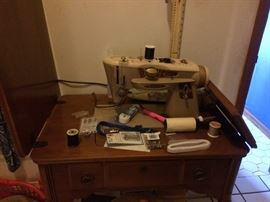 sewing machine with cabient and bench 