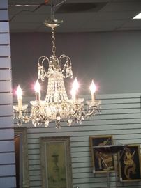 This is a Schonbek 12 light. 23"x20" crystal chandelier really SUPREME!