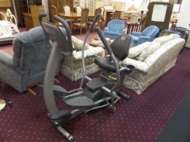 Octane Fitness XR4C elliptical, this machine still has the new paper covering the display.