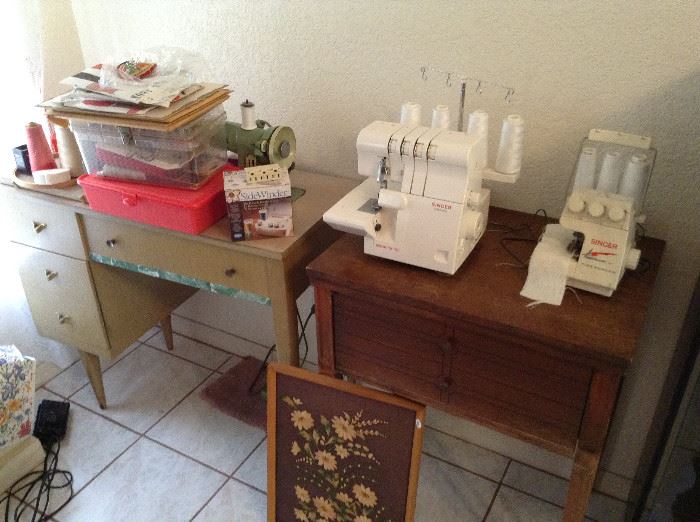 Singer serger, Tiny Serger, built in sewing machine, and free standing singer sewing machine. 