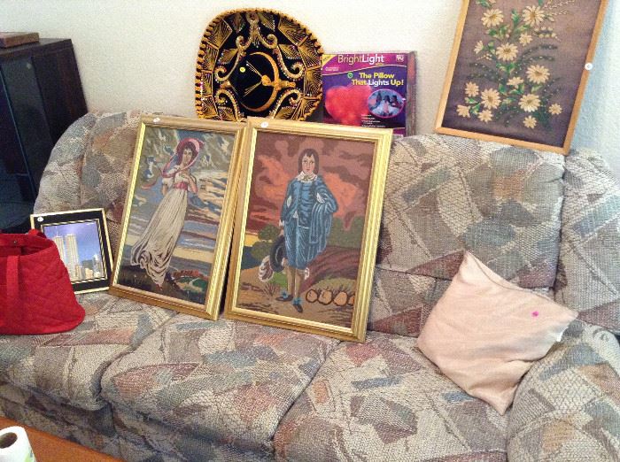 Lady in pink and man in blue cross stitch pictures. Sofa, sombrero, etc
