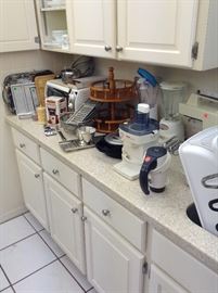 toaster oven, double tiered lazy Susan. blenders, graters, serving trays, sifters, Belgium waffle maker. 