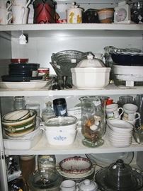 cabinets filled with glassware and collectibles 