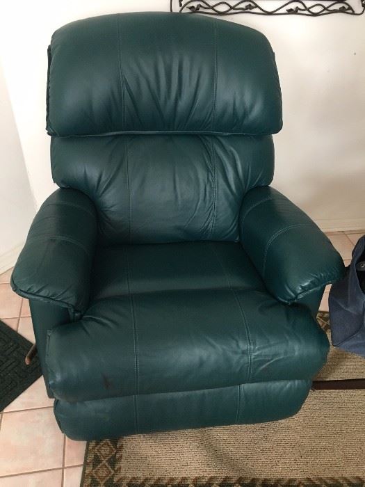 dark green leather recliner, matches the couch