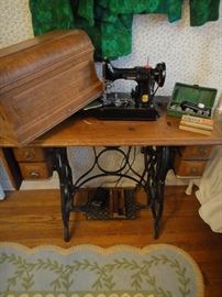 Singer Sewing machine( 221-1), Accessories and cabinet,  Excellent condition 