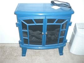 LIL ELECTRIC FIREPLACE,PORCELAIN ON STEEL.