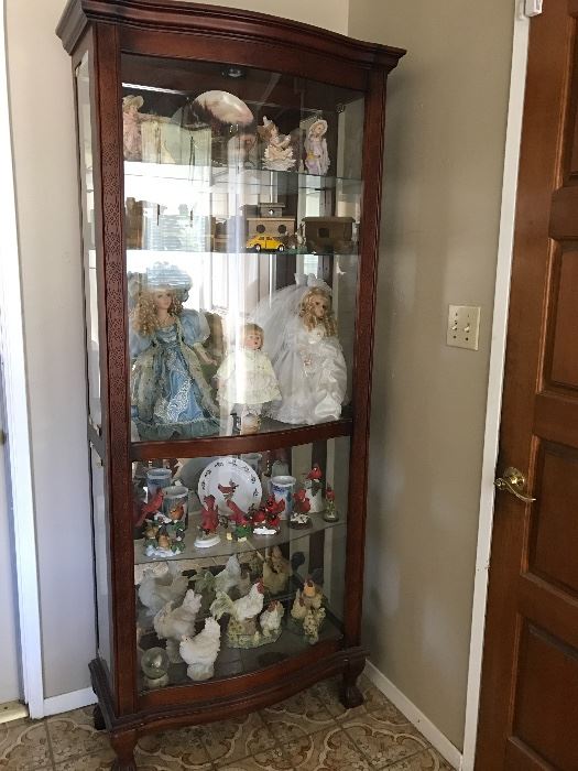Curio cabinet/porcelain dolls