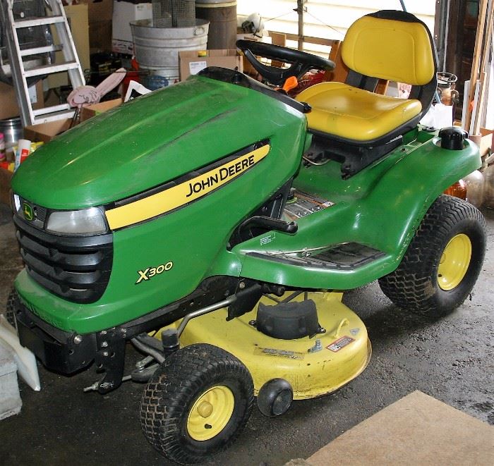 John Deer X300 Lawn Tractor w/Bagger (2613 Hrs.)