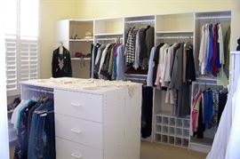 Love this closet!! Full of clothing, shoes, linens, etc.
