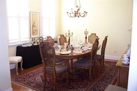 View of the dining room - table with 8 chairs (2 arm and 6 sides)