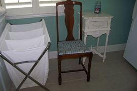 Nice laundry basket and painted bedside table