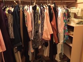 Many closets full of women's clothing and 2 closets of men's too!