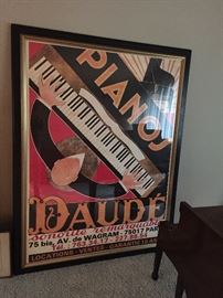 This is a poster created in the 1970’s to announce the new location and telephone number of the Pianos Daude Company.  It utilizes the original design created by Monsieur Daude the owner of the company, in the 1920s. In it Mr. Daude is shown playing one of his pianos. The artwork is an Art Deco classic design with fine details. This is an Original ca. 1970 Vintage Poster; it is not a reproduction. This poster is huge and in an expensive frame!