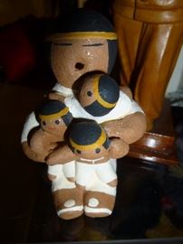 STORYTELLER WITH 3 CHILDREN BY MARGARET QUINTANA