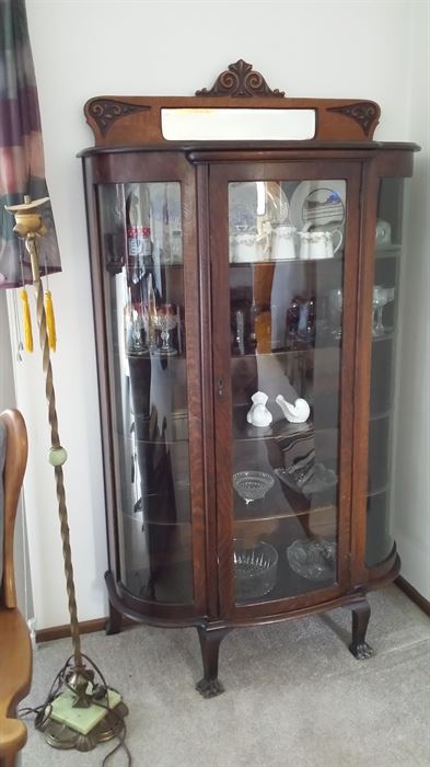 Antique curved front curio cabinet win clawfeet