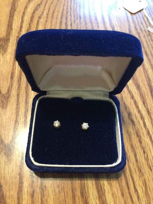 Genuine diamond earrings. Approximately .5 total carat weight. 